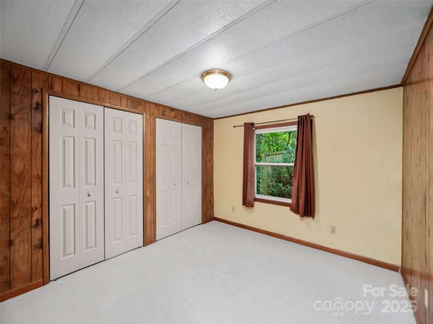 64 Mountain Site Lane, Asheville, NC 28803.  MLS# CAR4291467, YatesRealty ID 31735. 