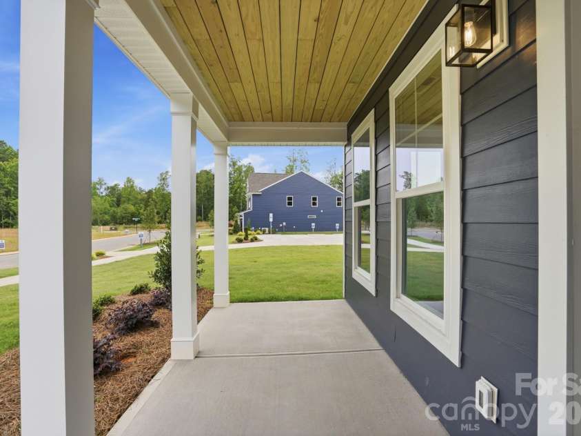 5917 New River Drive, Huntersville, NC 28078.  MLS# CAR4359977, YatesRealty ID 31748. Front Porch