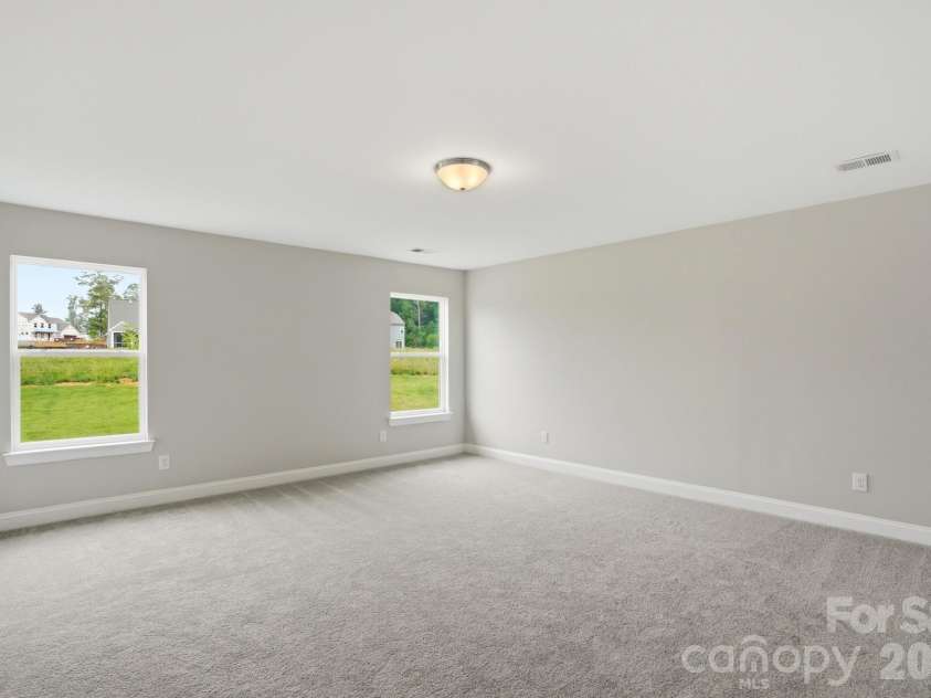 5917 New River Drive, Huntersville, NC 28078.  MLS# CAR4359977, YatesRealty ID 31748. Primary Bedroom