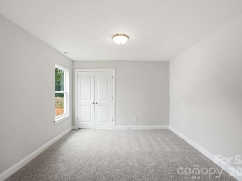 5917 New River Drive, Huntersville, NC 28078.  MLS# CAR4359977, YatesRealty ID 31748. Sitting Room in Primary Bedroom