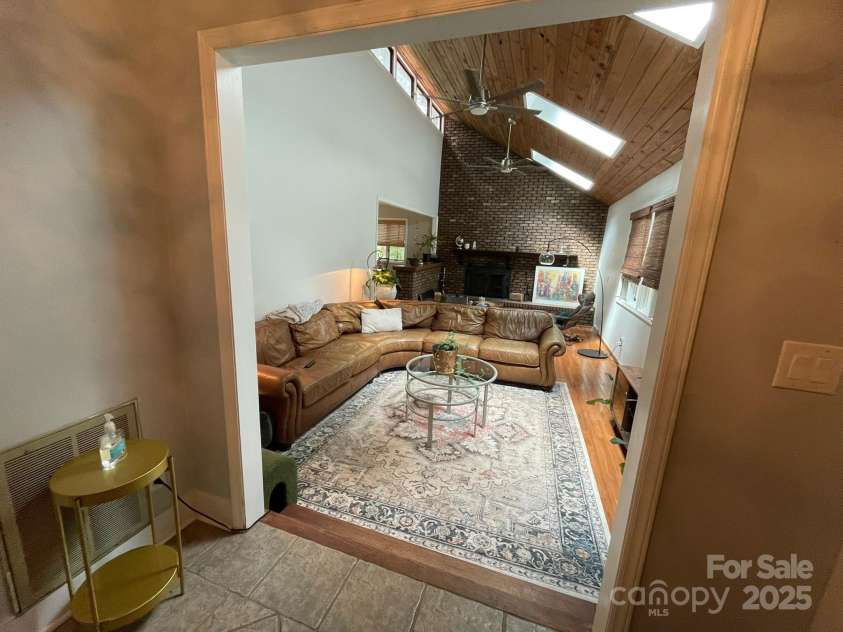 5434 Beckhaven Lane, Charlotte, NC 28216.  MLS# CAR4330987, YatesRealty ID 3175. Entryway to Step Down Family Room