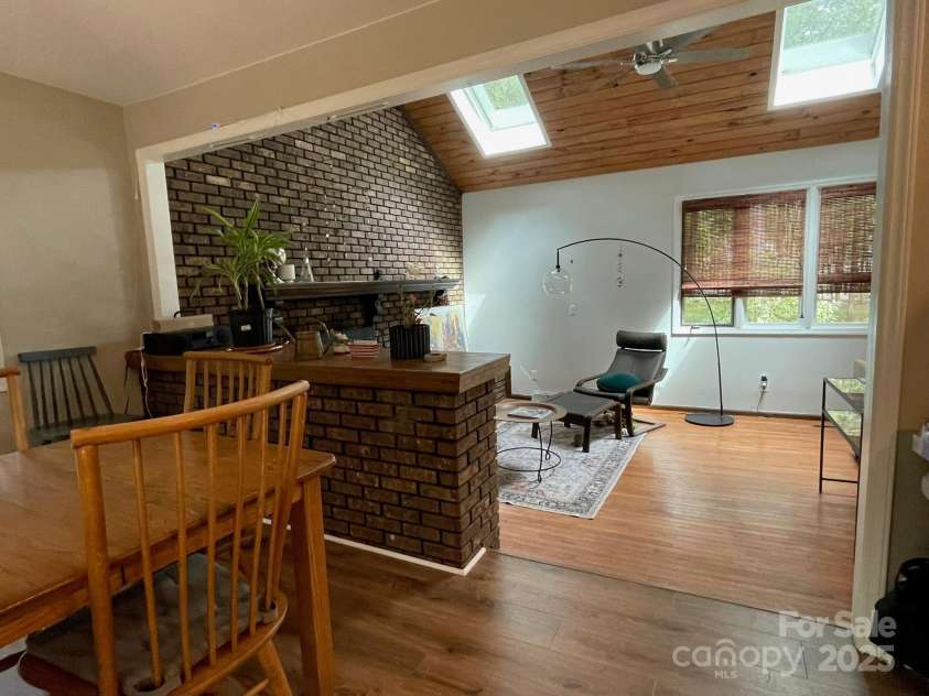 5434 Beckhaven Lane, Charlotte, NC 28216.  MLS# CAR4330987, YatesRealty ID 3175. Step into the Dining and Kitchen area from Family Room