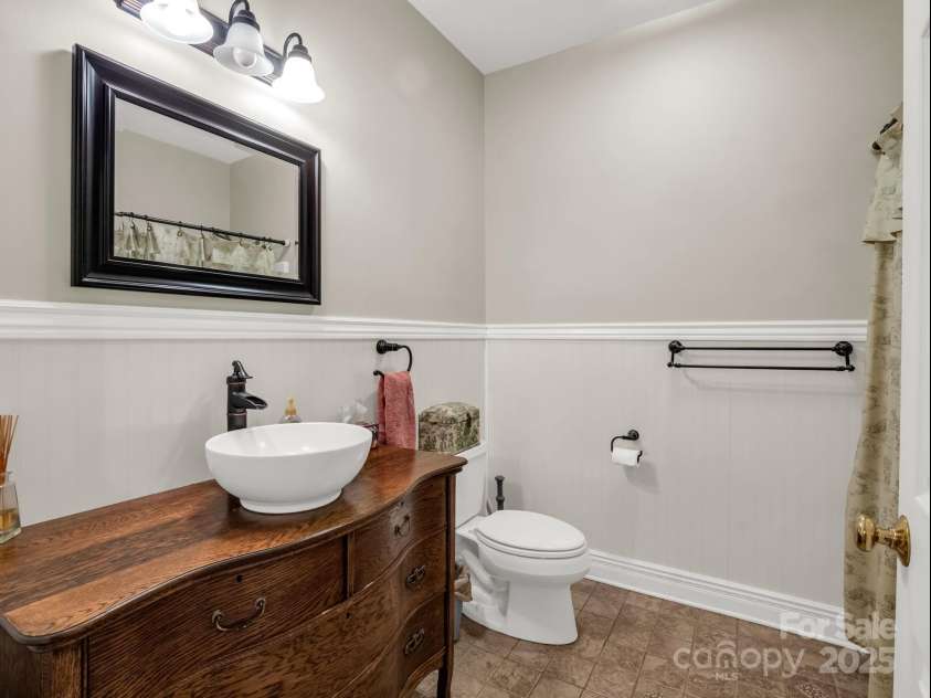1615 Oak Park Court, Iron Station, NC 28080.  MLS# CAR4317831, YatesRealty ID 31754. Hall bath - custom vanity