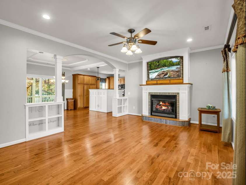 1615 Oak Park Court, Iron Station, NC 28080.  MLS# CAR4317831, YatesRealty ID 31754. LR - notice the custom built in shelving