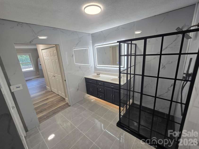 29386 Nelson Mountain Road, Albemarle, NC 28001.  MLS# CAR4369347, YatesRealty ID 31755. Primary bath