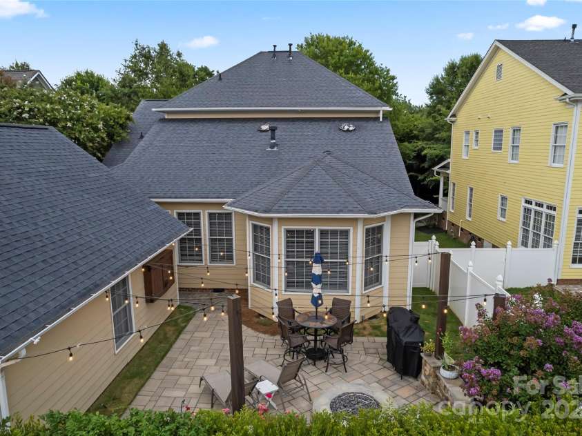 878 Promenade Walk, Fort Mill, SC 29708.  MLS# CAR4281286, YatesRealty ID 31755. Grilling, string lights, a TV...you may never leave your backyard!