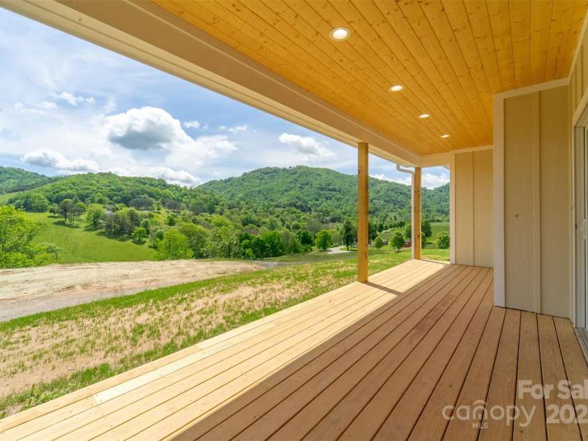 70 Knox Best Street, Clyde, NC 28721.  MLS# CAR4259542, YatesRealty ID 31756. Back Porch Views