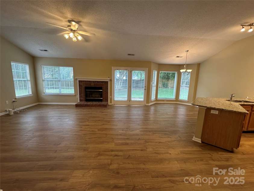 5416 Hedgecrest Place, Charlotte, NC 28269.  MLS# CAR4287168, YatesRealty ID 31760. Open Transitional Home