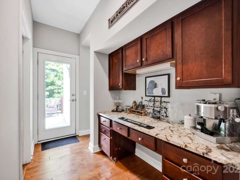 14940 Carbert Lane, Huntersville, NC 28078.  MLS# CAR4256086, YatesRealty ID 31763. Butler's Pantry leading to laundry and large front porch