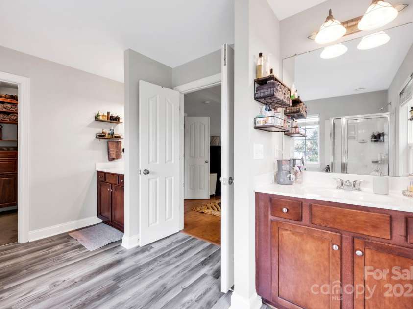 14940 Carbert Lane, Huntersville, NC 28078.  MLS# CAR4256086, YatesRealty ID 31763. Primary Bath w/ garden tub and separate shower, dual vanities