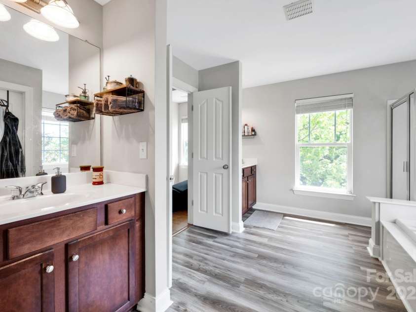 14940 Carbert Lane, Huntersville, NC 28078.  MLS# CAR4256086, YatesRealty ID 31763. Primary Bath w/ garden tub and separate shower, dual vanities