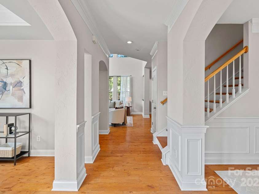 14940 Carbert Lane, Huntersville, NC 28078.  MLS# CAR4306108, YatesRealty ID 31763. Beautiful upgraded floors throughout the entire house! Nice foyer with wainscoting and crown molding!