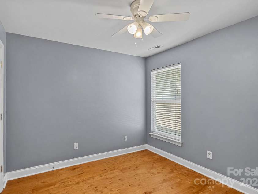 14940 Carbert Lane, Huntersville, NC 28078.  MLS# CAR4306108, YatesRealty ID 31763. Bedroom #3 with a ceiling fan!