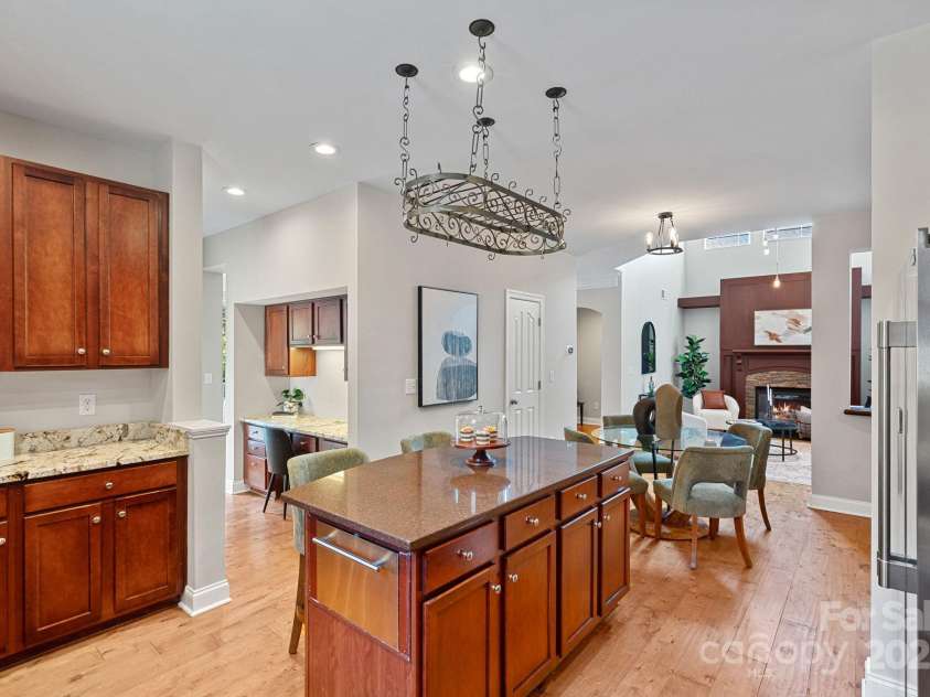 14940 Carbert Lane, Huntersville, NC 28078.  MLS# CAR4306108, YatesRealty ID 31763. Built in wine cooler on the island!