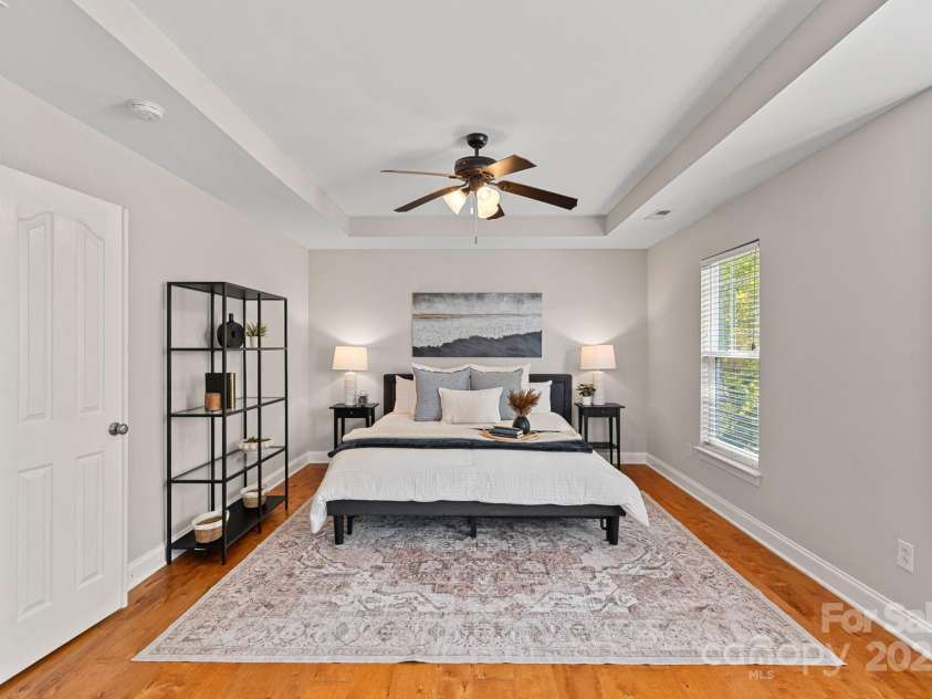 14940 Carbert Lane, Huntersville, NC 28078.  MLS# CAR4306108, YatesRealty ID 31763. Huge primary bedroom with a tray ceiling and ceiling fan!