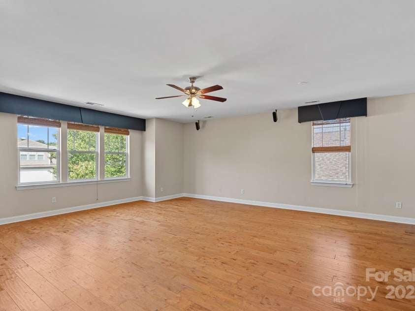 14940 Carbert Lane, Huntersville, NC 28078.  MLS# CAR4306108, YatesRealty ID 31763. Large 4th bedroom or bonus room with a ceiling fan and tons of natural light!