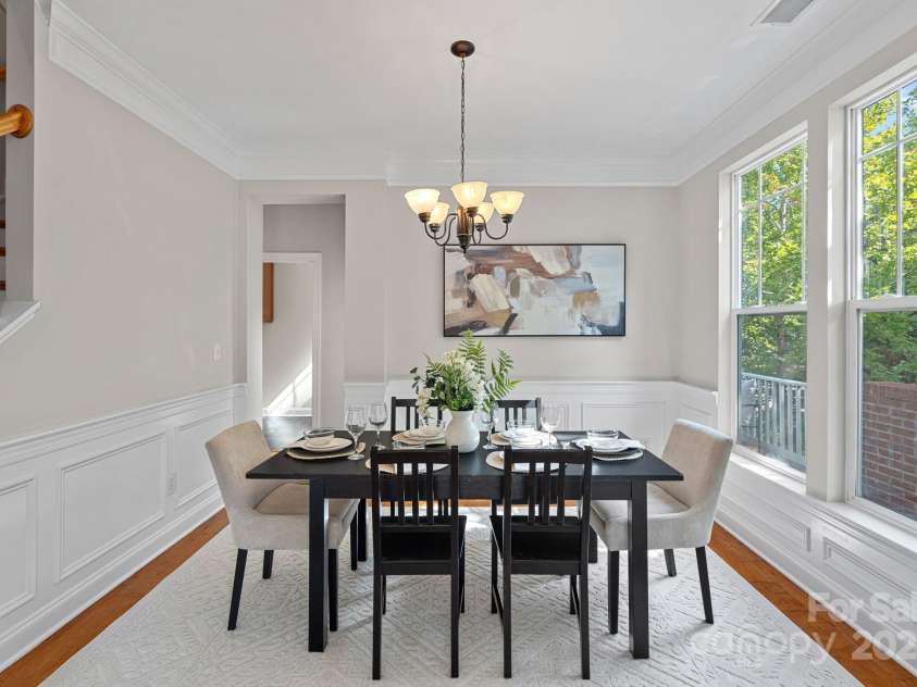 14940 Carbert Lane, Huntersville, NC 28078.  MLS# CAR4306108, YatesRealty ID 31763. Lovely dining room with crown molding and wainscoting!