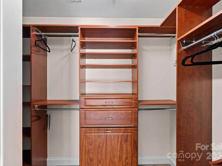 14940 Carbert Lane, Huntersville, NC 28078.  MLS# CAR4306108, YatesRealty ID 31763. Walk-in closet off of the primary bathroom with custom built-ins!