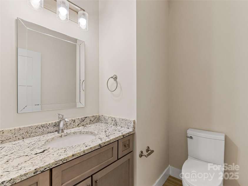 29 Farm Pond Lane, Candler, NC 28715.  MLS# CAR4258742, YatesRealty ID 31766. Half Bath off main living areas