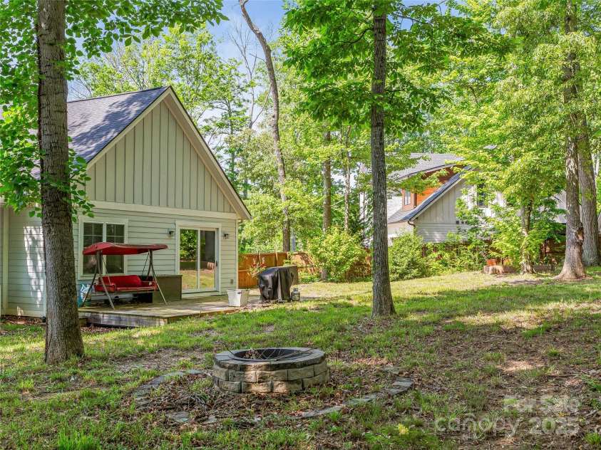 29 Farm Pond Lane, Candler, NC 28715.  MLS# CAR4258742, YatesRealty ID 31766. Mature trees