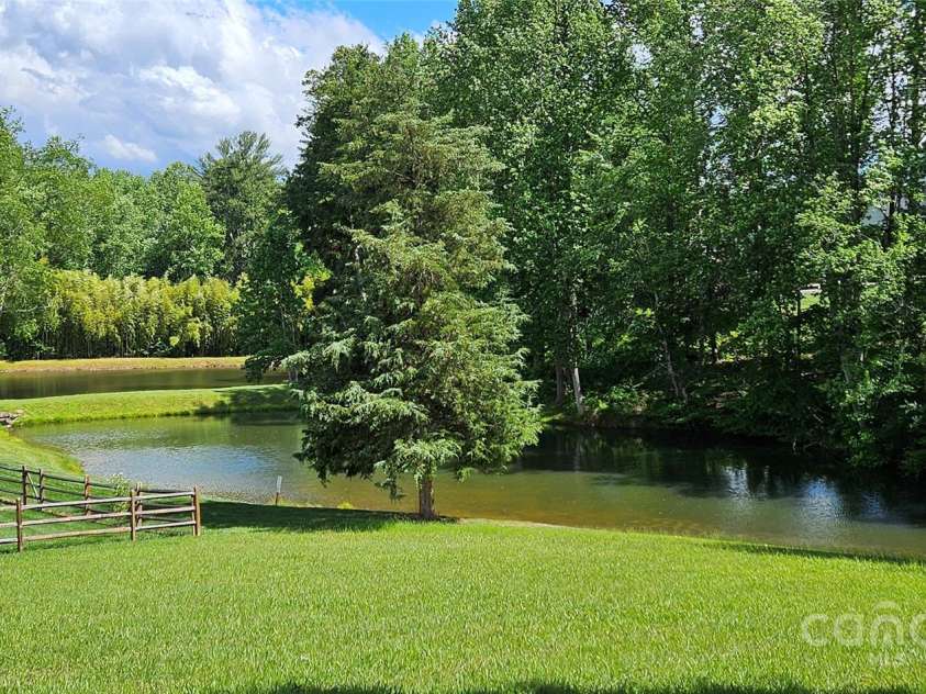 29 Farm Pond Lane, Candler, NC 28715.  MLS# CAR4258742, YatesRealty ID 31766. Stocked community pond