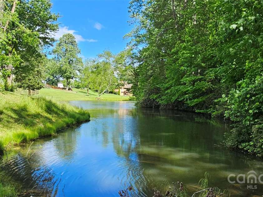 29 Farm Pond Lane, Candler, NC 28715.  MLS# CAR4258742, YatesRealty ID 31766. Stocked community pond