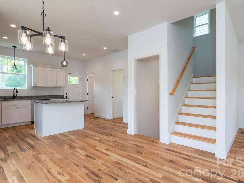 6 Berry Crest Lane, Arden, NC 28704.  MLS# CAR4391347, YatesRealty ID 31768. Kitchen island great for entertaining