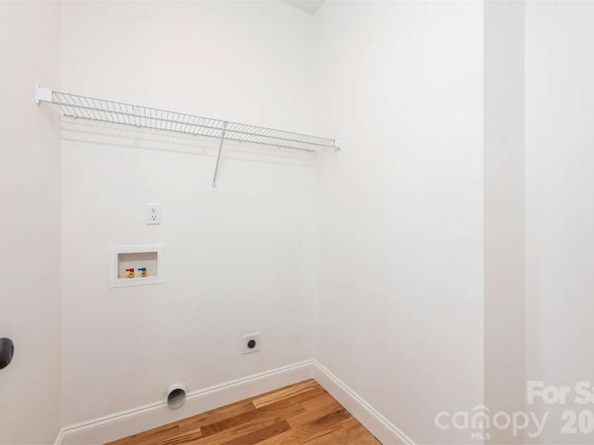 6 Berry Crest Lane, Arden, NC 28704.  MLS# CAR4391347, YatesRealty ID 31768. Laundry room off the kitchen