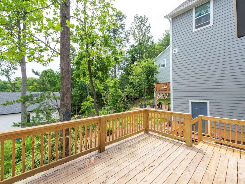 6 Berry Crest Lane, Arden, NC 28704.  MLS# CAR4391347, YatesRealty ID 31768. Spacious back deck
