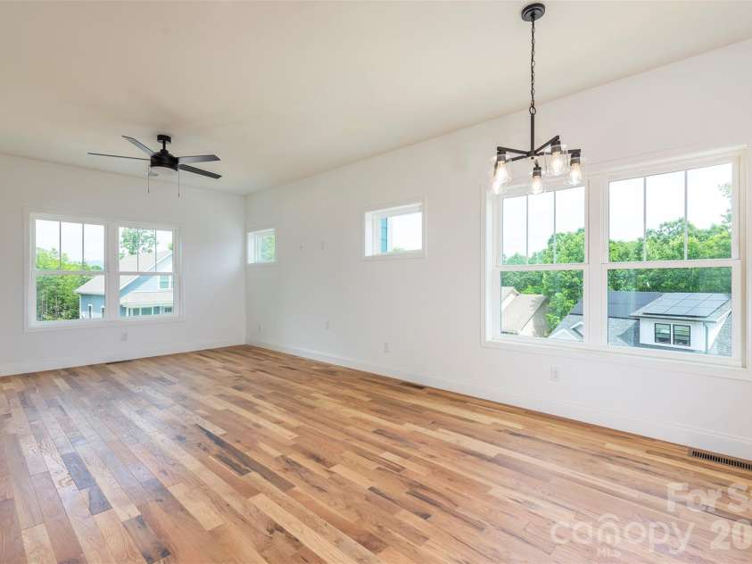 6 Berry Crest Lane, Arden, NC 28704.  MLS# CAR4391347, YatesRealty ID 31768. Your plants will love the windows!