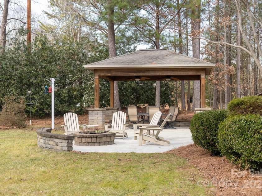 7674 Bermuda Hills Lane, Denver, NC 28037.  MLS# CAR4222010, YatesRealty ID 3177. Gazebo and fire pit