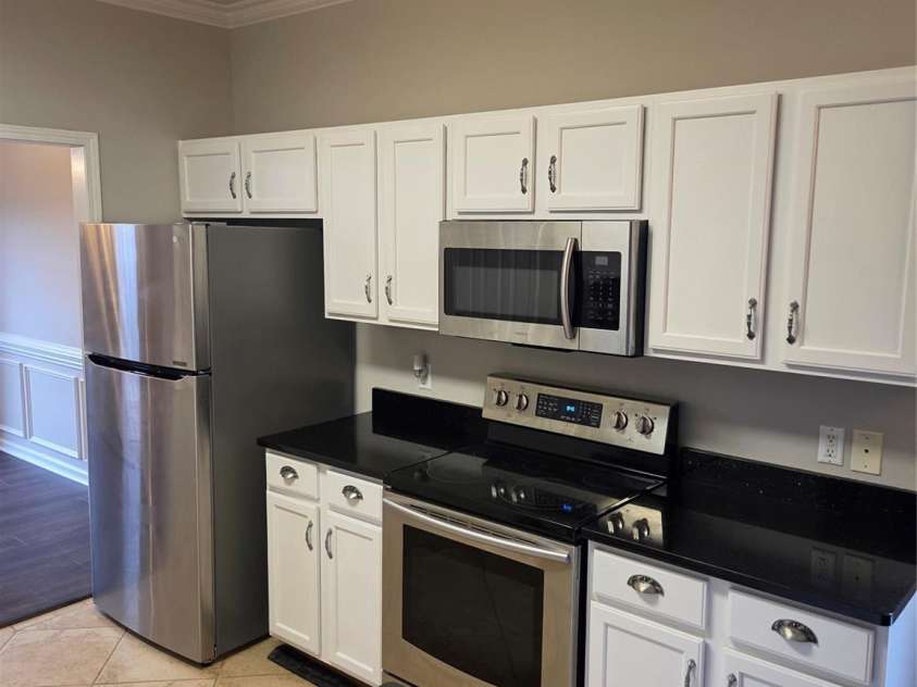 4155 Guilford Court, Concord, NC 28027.  MLS# CAR4244954, YatesRealty ID 31776. Kitchen with stainless steel appliances