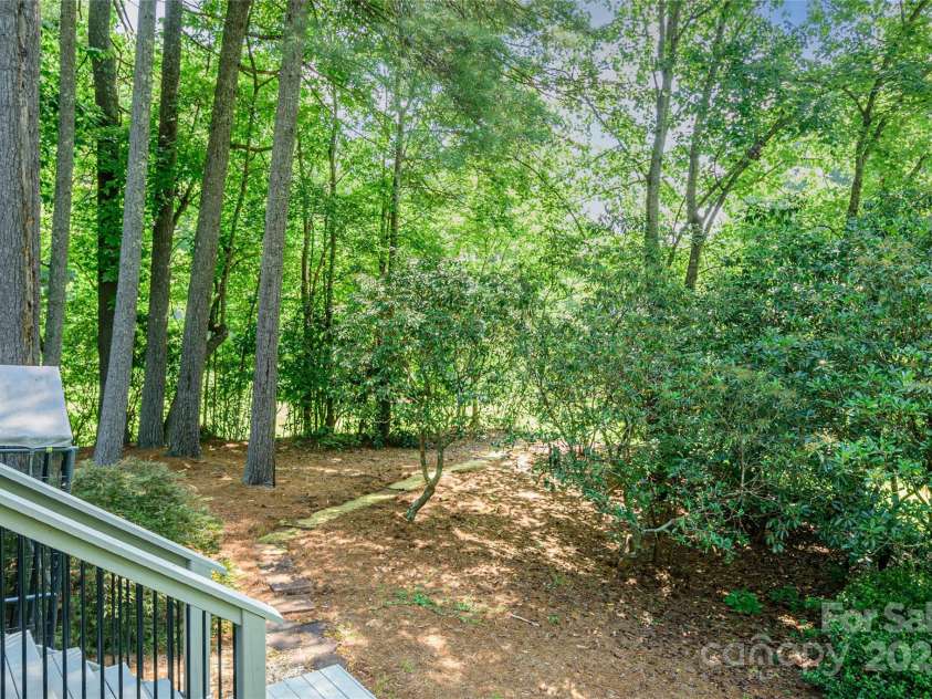 35 Tall Pines Road, Hendersonville, NC 28739.  MLS# CAR4286484, YatesRealty ID 31778. Back Yard