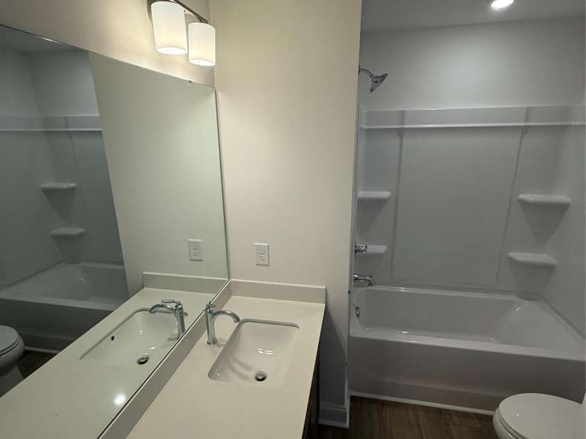 2217 Gladwyne Place, Charlotte, NC 28269.  MLS# CAR4395753, YatesRealty ID 31784. Representative Photos From Home 12 A - 2nd Bathroom