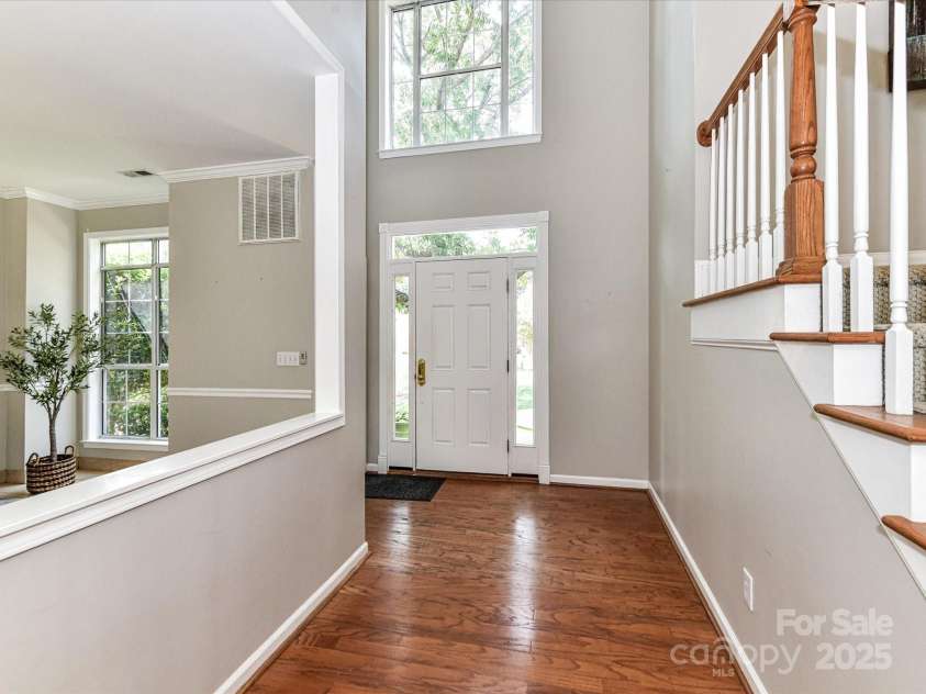 9029 Torrence Crossing Drive, Huntersville, NC 28078.  MLS# CAR4275401, YatesRealty ID 31784. 2 Story Foyer with plentiful natural light flowing through!