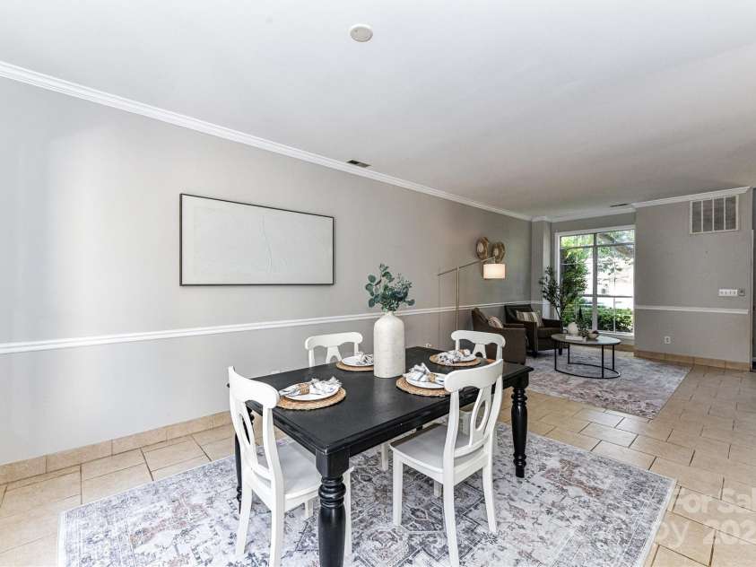 9029 Torrence Crossing Drive, Huntersville, NC 28078.  MLS# CAR4275401, YatesRealty ID 31784. Formal Dining with crown molding & tile floors!