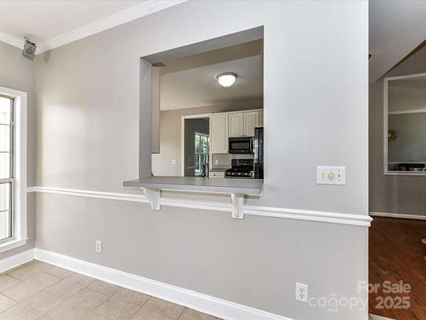 9029 Torrence Crossing Drive, Huntersville, NC 28078.  MLS# CAR4275401, YatesRealty ID 31784. Kitchen pass through!