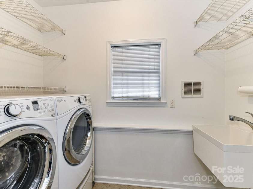 9029 Torrence Crossing Drive, Huntersville, NC 28078.  MLS# CAR4275401, YatesRealty ID 31784. Laundry Room on main level with Washer/Dryer to remain!
