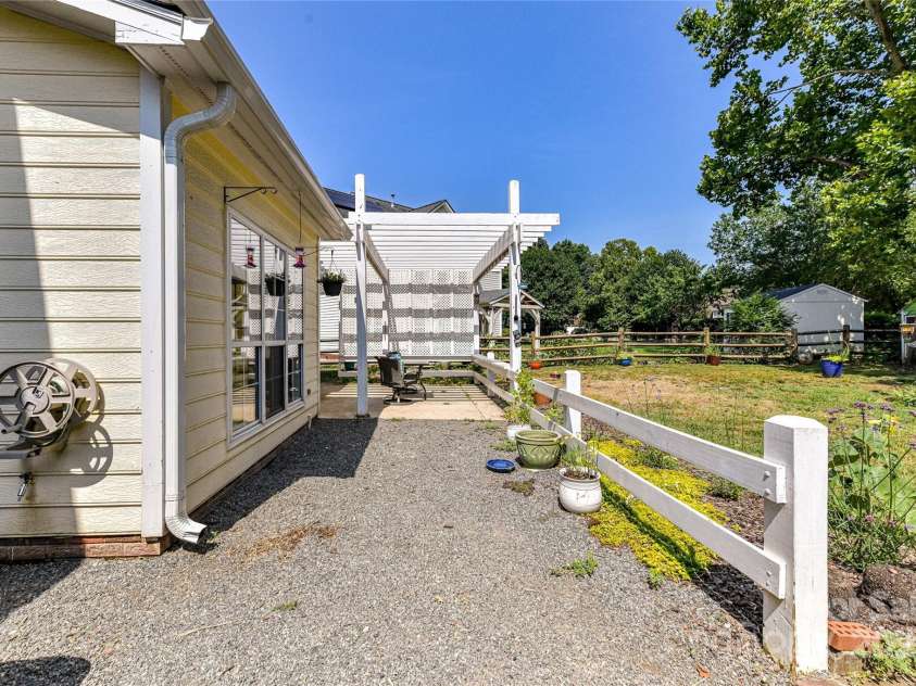 9029 Torrence Crossing Drive, Huntersville, NC 28078.  MLS# CAR4275401, YatesRealty ID 31784. Path to Patio Area with Pergola!