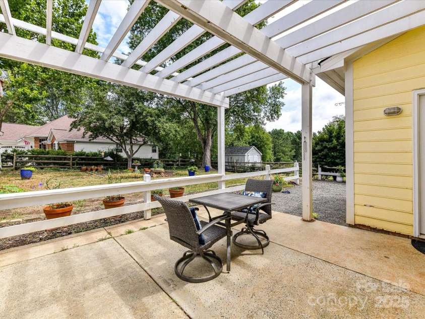 9029 Torrence Crossing Drive, Huntersville, NC 28078.  MLS# CAR4275401, YatesRealty ID 31784. Patio Area with Pergola!