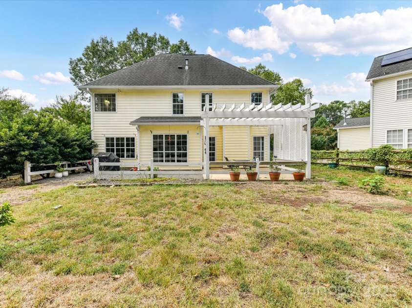 9029 Torrence Crossing Drive, Huntersville, NC 28078.  MLS# CAR4275401, YatesRealty ID 31784. So much space in this fenced, level back yard perfect for gardening or activities!