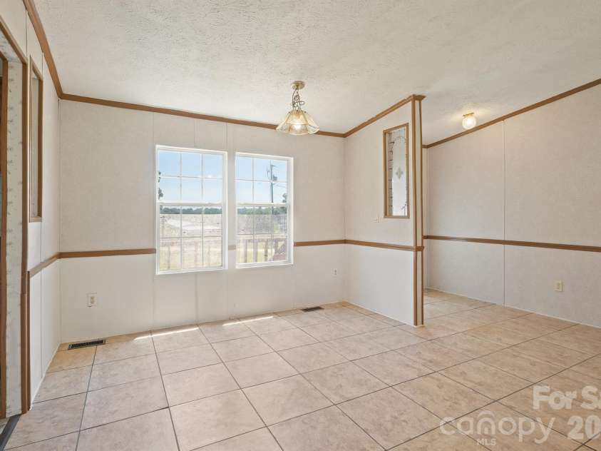 153 Wild Cherry Drive, Statesville, NC 28625.  MLS# CAR4395299, YatesRealty ID 31798. 