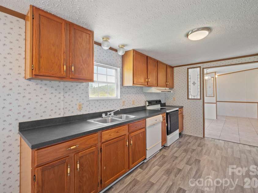 153 Wild Cherry Drive, Statesville, NC 28625.  MLS# CAR4395299, YatesRealty ID 31798. Kitchen