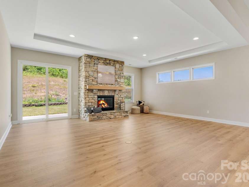 8091 Woodline Lane, Denver, NC 28037.  MLS# CAR4388004, YatesRealty ID 31799. Light-filled, neutral living spaces designed to complement your style (Virtually Staged Fire)
