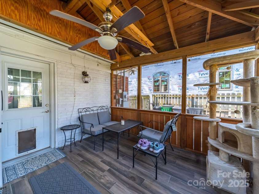1623 Geneva Court, Charlotte, NC 28209.  MLS# CAR4235982, YatesRealty ID 3180. Screened porch