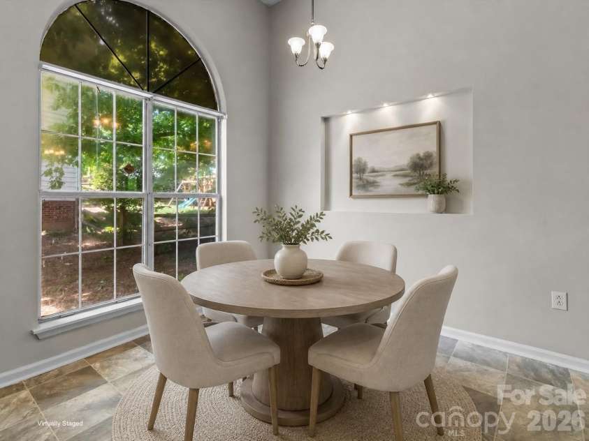 11823 Harris Ridge Drive, Charlotte, NC 28269.  MLS# CAR4370842, YatesRealty ID 31801. Breakfast area, virtually staged.