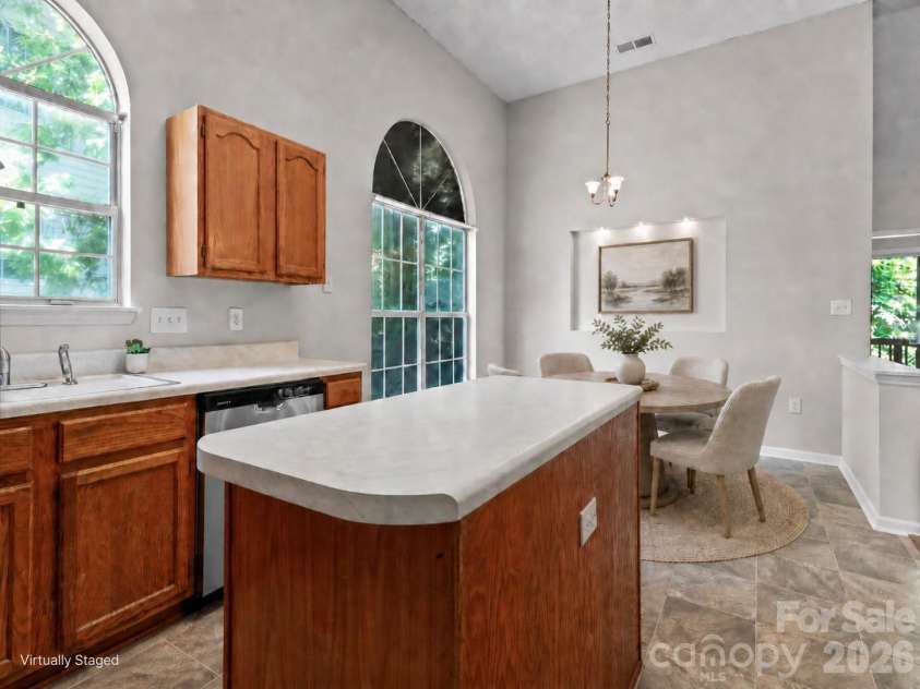 11823 Harris Ridge Drive, Charlotte, NC 28269.  MLS# CAR4370842, YatesRealty ID 31801. Kitchen breakfast area virtually staged