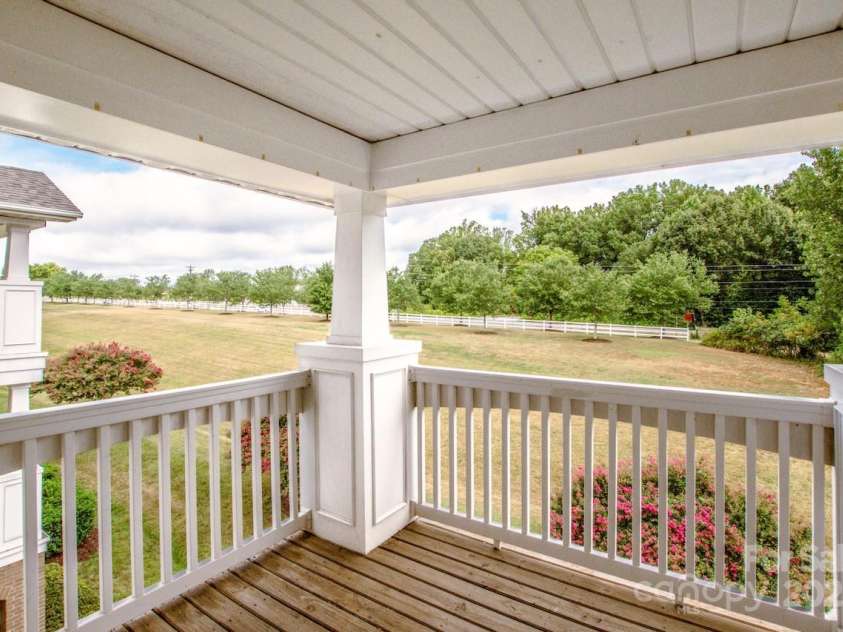 17151 Doe Valley Court, Cornelius, NC 28031.  MLS# CAR4286803, YatesRealty ID 31801. A Covered Balcony