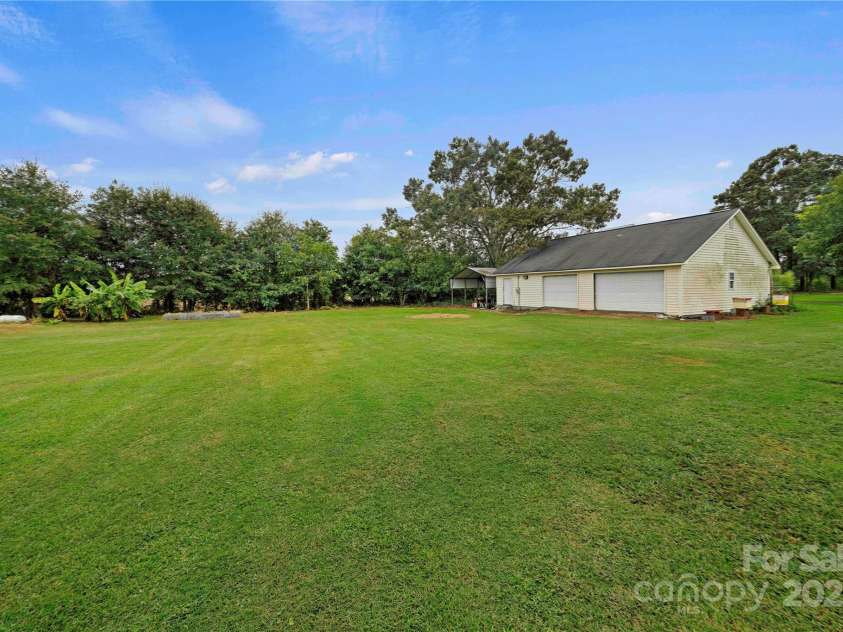 2207 Stagecoach Trail, Shelby, NC 28150.  MLS# CAR4290259, YatesRealty ID 31813. Detached Garage & Carport