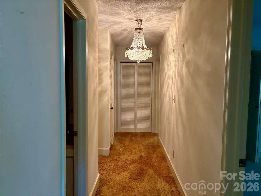 5500 Saddlewood Lane, Mint Hill, NC 28227.  MLS# CAR4382931, YatesRealty ID 31815. Beautiful chandelier.